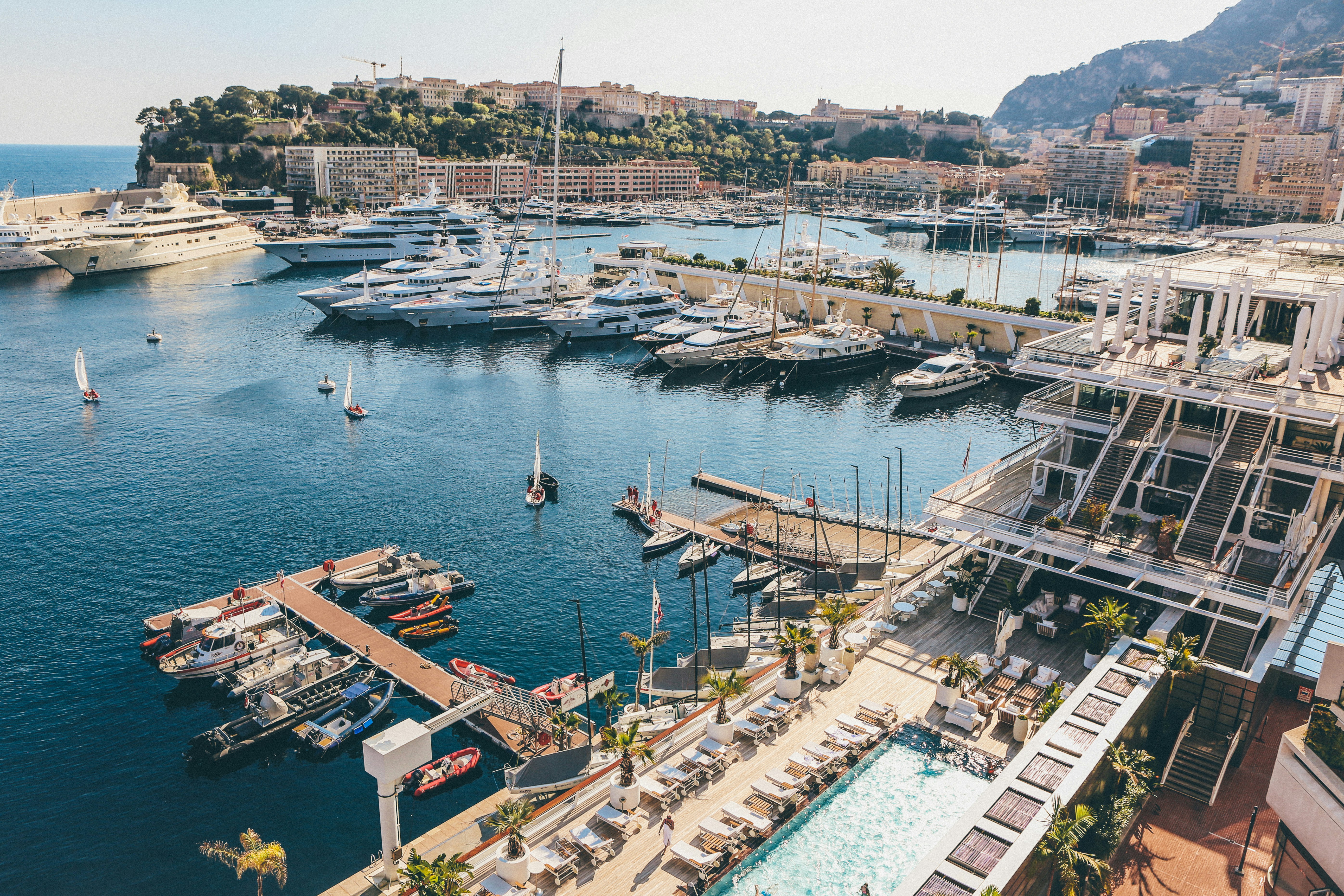 aerial photography of docks with yachts and motorboats during daytime